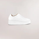 White vegan slip-on wedge sneakers with cushioned sole - سنيكرز ويدج نباتي باللون الأبيض تُلبس بسهولة مع نعل مبطن