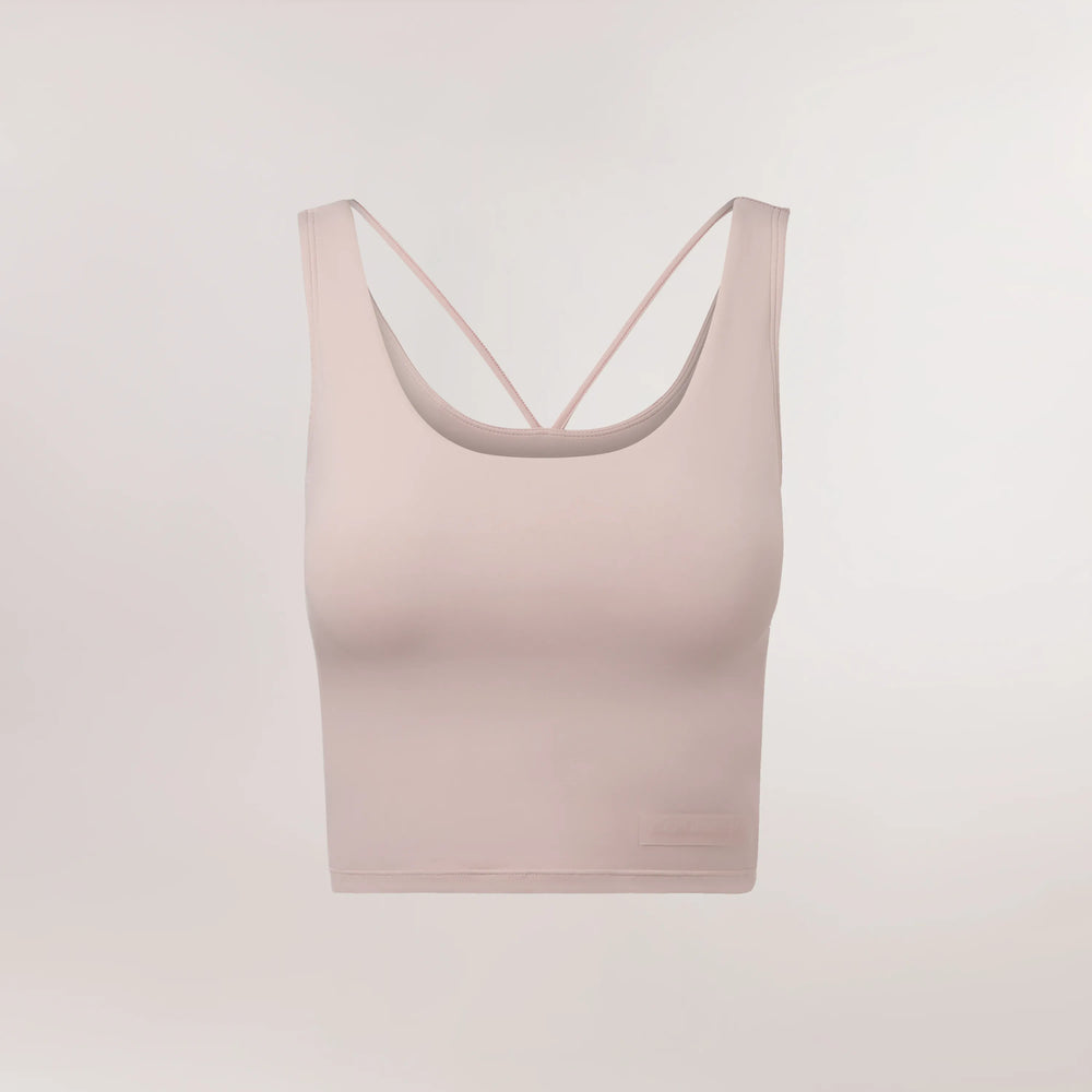 Light pink cropped top with stretch and racerback - بلوزة قصيرة باللون الوردي الفاتح مع ظهر رياضي