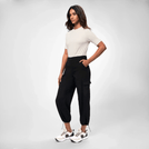 A model wearing seasonal black cargo pants & short sleeve t-shirt - عارضة أزياء ترتدي بنطلون أسود وتيشيرت قصير الأكمام