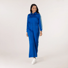 A model wearing seasonal blue jumpsuit - عارضة أزياء ترتدي جمبسوت زرقاء