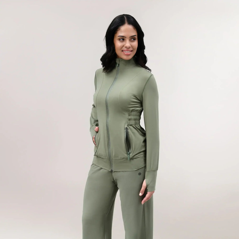 A core musk green Flow active jacket with elasticated back detail -  سترة رياضية "فلو" باللون الأخضر مع تفاصيل ظهر مرنة