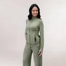 A core musk green Flow active jacket with elasticated back detail -  سترة رياضية "فلو" باللون الأخضر مع تفاصيل ظهر مرنة