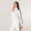 A model wearing seasonal white track set with side stripes - عارضة ترتدي طقم رياضي موسمي باللون الأبيض بخطوط جانبية