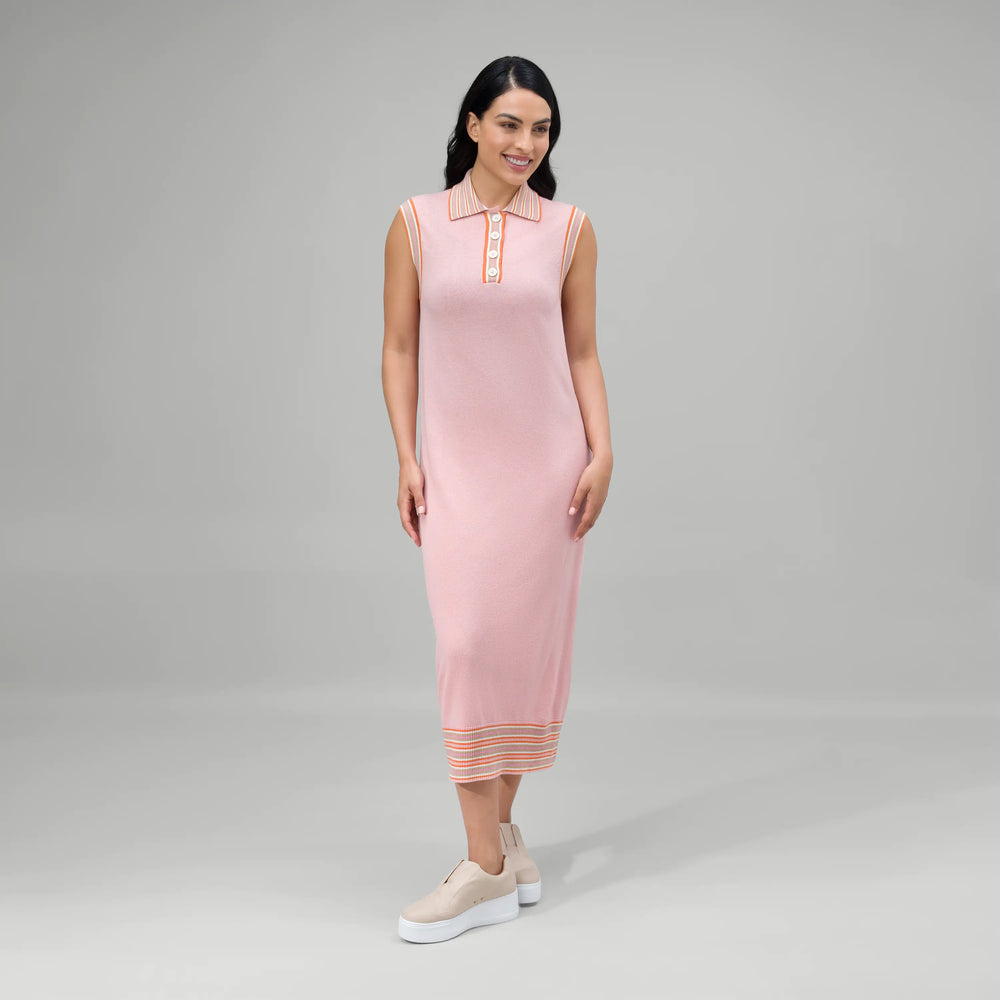 A model wearing cashmere maxi polo dress in a seasonal pink color - عارضة أزياء ترتدي فستان بولو ماكسي من الكشمير باللون الوردي