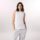 Ivory sleeveless knit sweater with relaxed silhouette - سترة محبوكة بدون أكمام بلون العاج بتصميم مريح