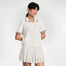 White Pointelle knit polo top with short sleeves & classic collar - تيشيرت بولو أبيض محبوك بأكمام قصيرة وياقة كلاسيكية