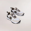 Rainforest Pivot Dance sneakers with cushioned sole & performance fit - عارضة أزياء ترتدي حذاء "بيفوت دانس" بلون رينفورست بنعل مبطّن وتصميم مناسب للأداء