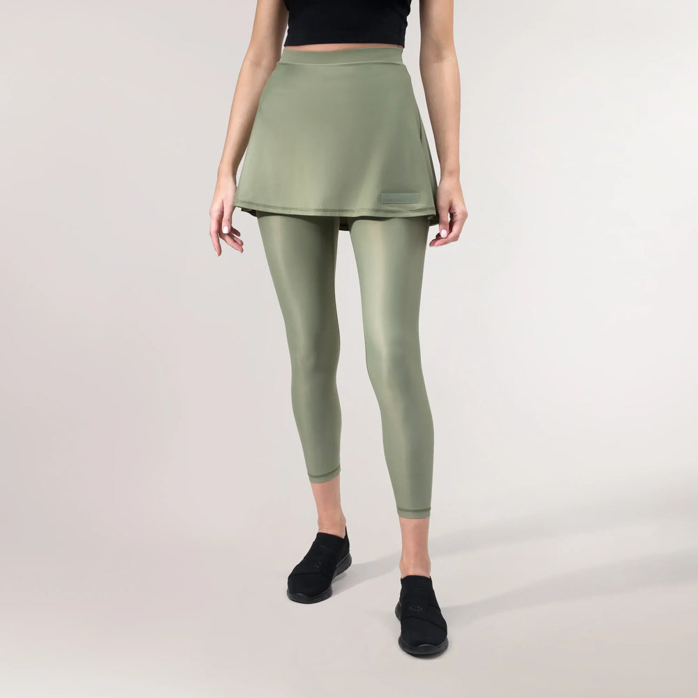 Musk green Glide skirt with a flowy fit with a built in leggings - تنورة "غلايد" باللون الأخضر بقصّة انسيابية مع ليقنز مدمج أسفلها
