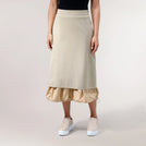 Beige straight skirt with gathered puff hem detail - تنورة مستقيمة باللون البيج مع جيبونة بأستيك من الأطراف