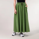 Dark musk green skirt with flared, sporty cut - تنورة خضراء مسكية داكنة بقصة رياضية واسعة