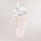 Light pink Kayanee x Stanley Quencher with branded lid & handle - كوب "كوينشر" من تعاون كياني × ستانلي باللون الوردي الفاتح مع غطاء ومقبض يحملان الشعار