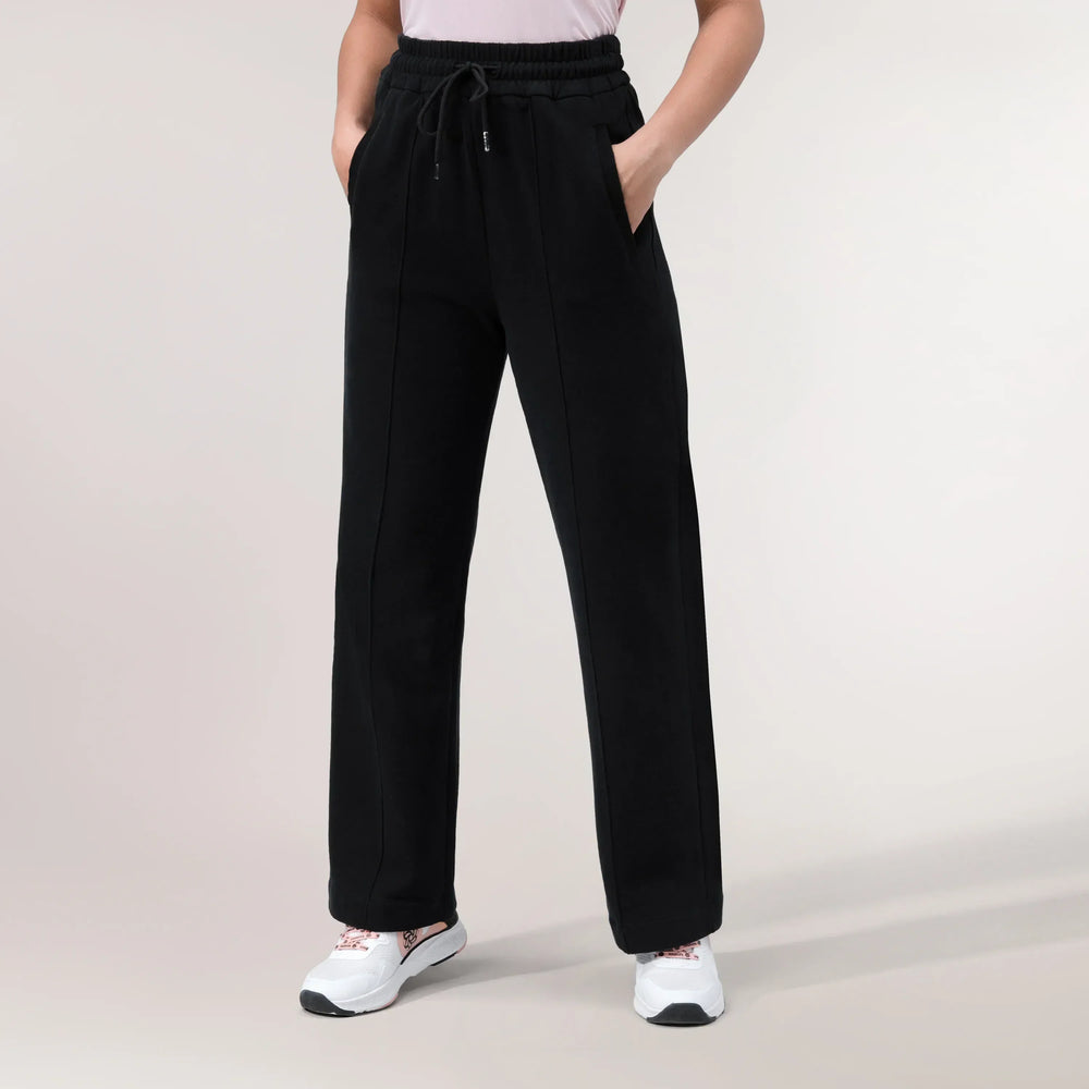 Black flared "Good To Go" track pants with elastic waist - بنطال تراك "جود تو جو" واسع باللون الأسود مع خصر مطاطي
