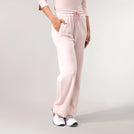 Light pink flared track pants with elastic waistband - بنطال رياضي واسع باللون الوردي الفاتح مع حزام خصر مطاطي