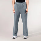 A model wearing a seasonal grey melange flare track pants - عارضة أزياء ترتدي بنطال رياضي واسع باللون الرمادي الميلانج