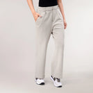 Oatmeal melange flare track pants with wide leg & relaxed shape - عارضة أزياء ترتدي بنطال رياضي واسع بلون الشوفان الممزوج وقصّة مريحة