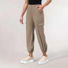 Sand colored cargo pants with flap pockets & tapered fit - بنطال كارغو باللون رملي بجيوب بغطاء وقصّة ضيقة عند الساقين