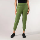 Walkabout dark green joggers with elastic waistband - عارضة أزياء ترتدي بنطال "ووك أباوت" باللون الأخضر الداكن وخصر مطاطي