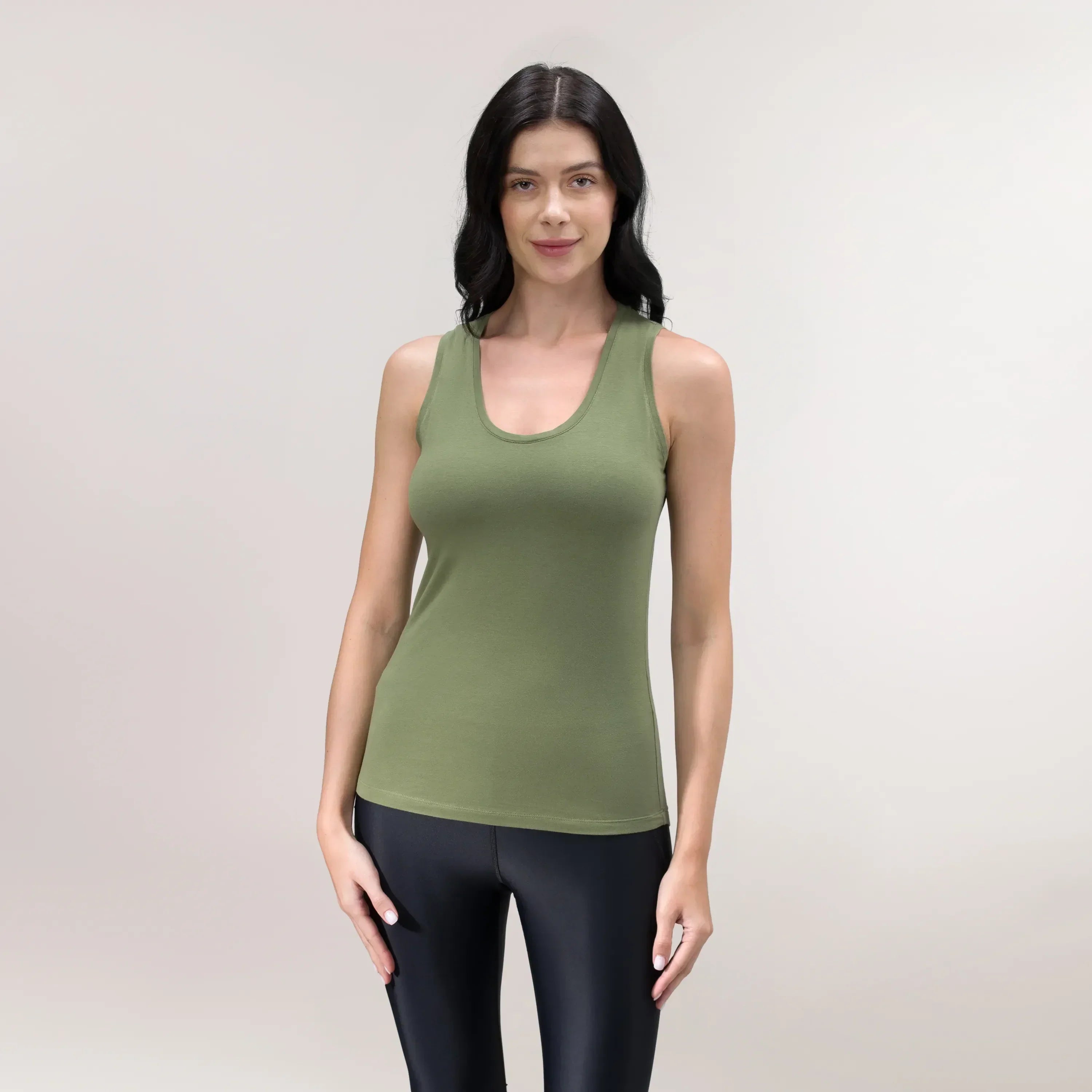 A model wearing a musk green