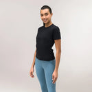 Black "Flow" top with soft fabric & a relaxed silhouette - توب "فلو" أسود بقماش ناعم وقصّة مريحة وانسيابية