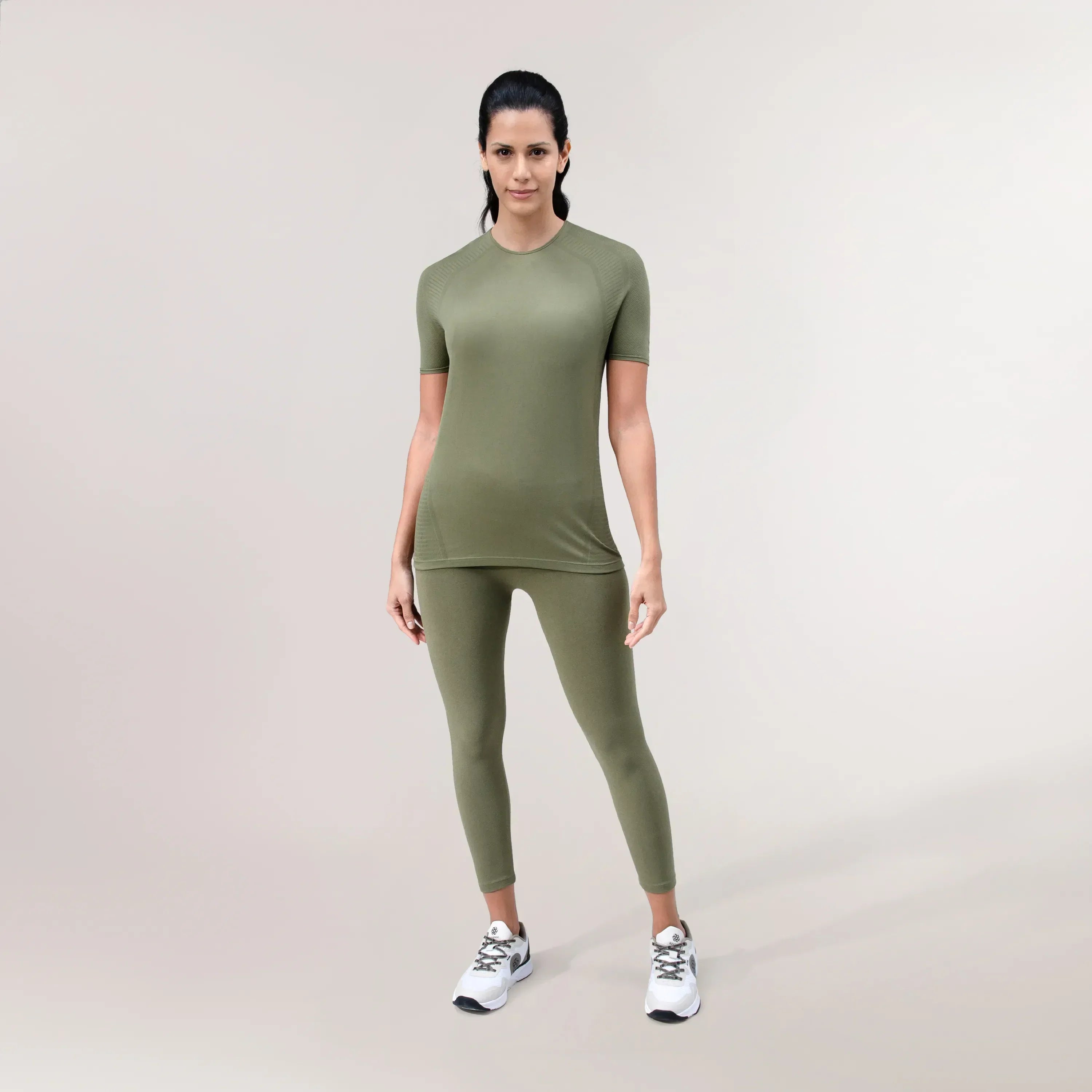 A model wearing musk green