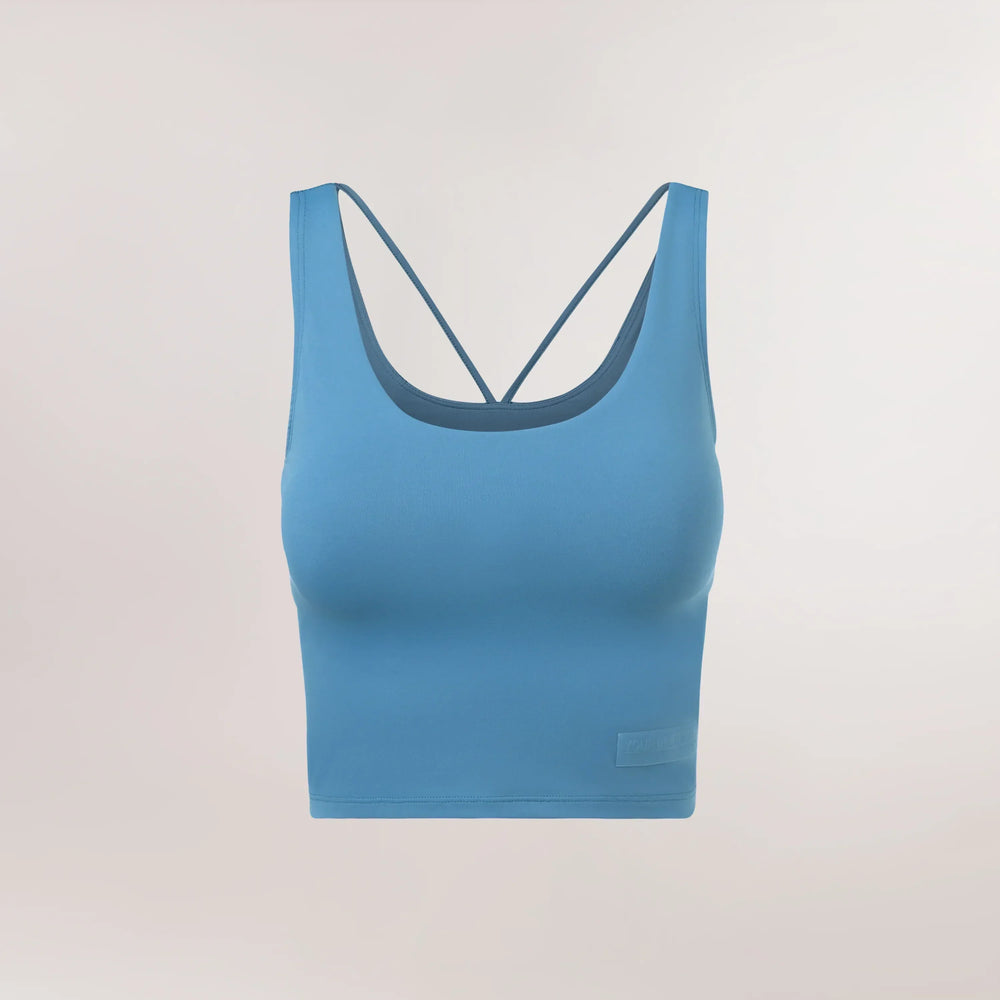 Blue cropped top with racerback and clean lines - بلوزة زرقاء قصيرة مع ظهر رياضي وخطوط