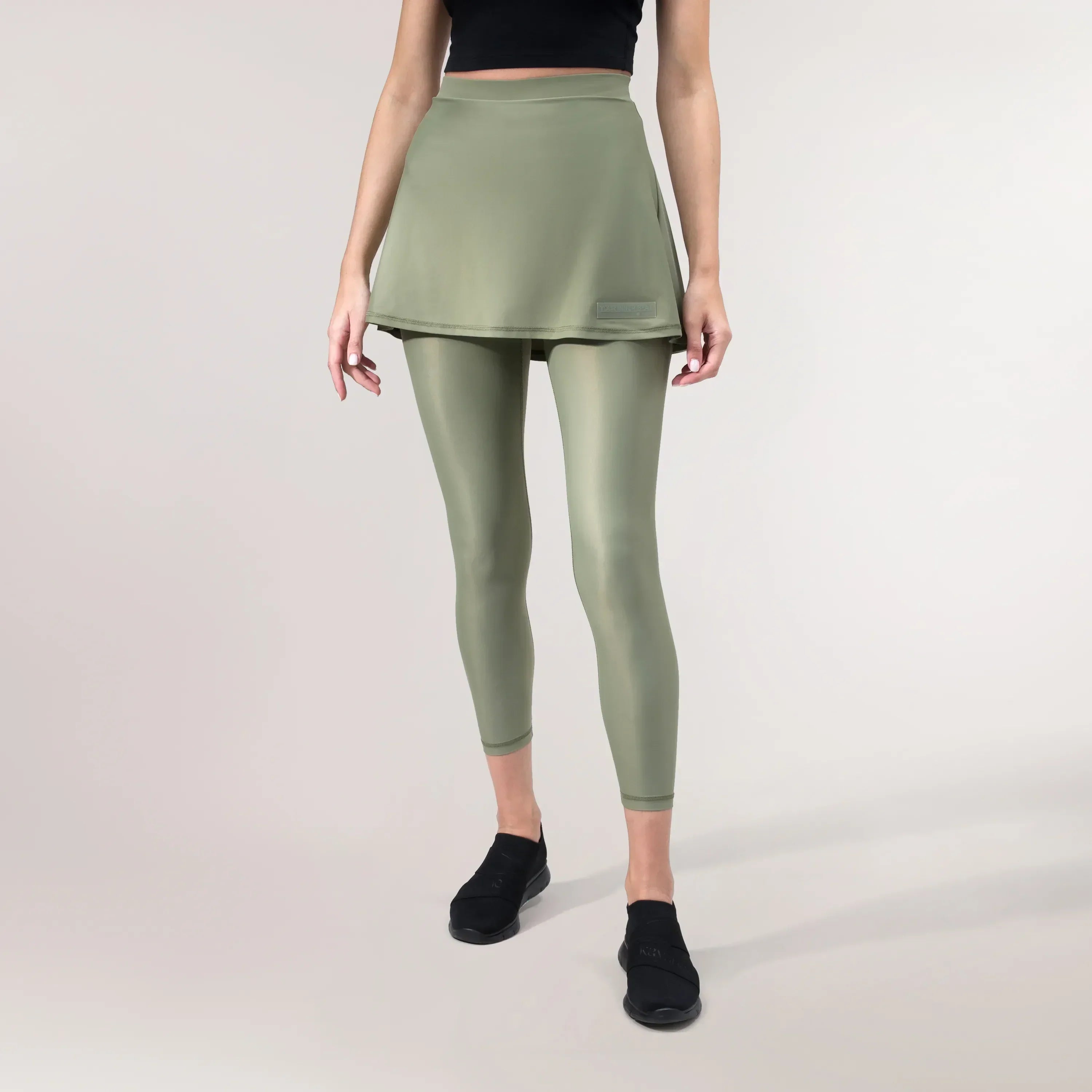 Musk green Glide skirt with a flowy fit with a built in leggings - تنورة 