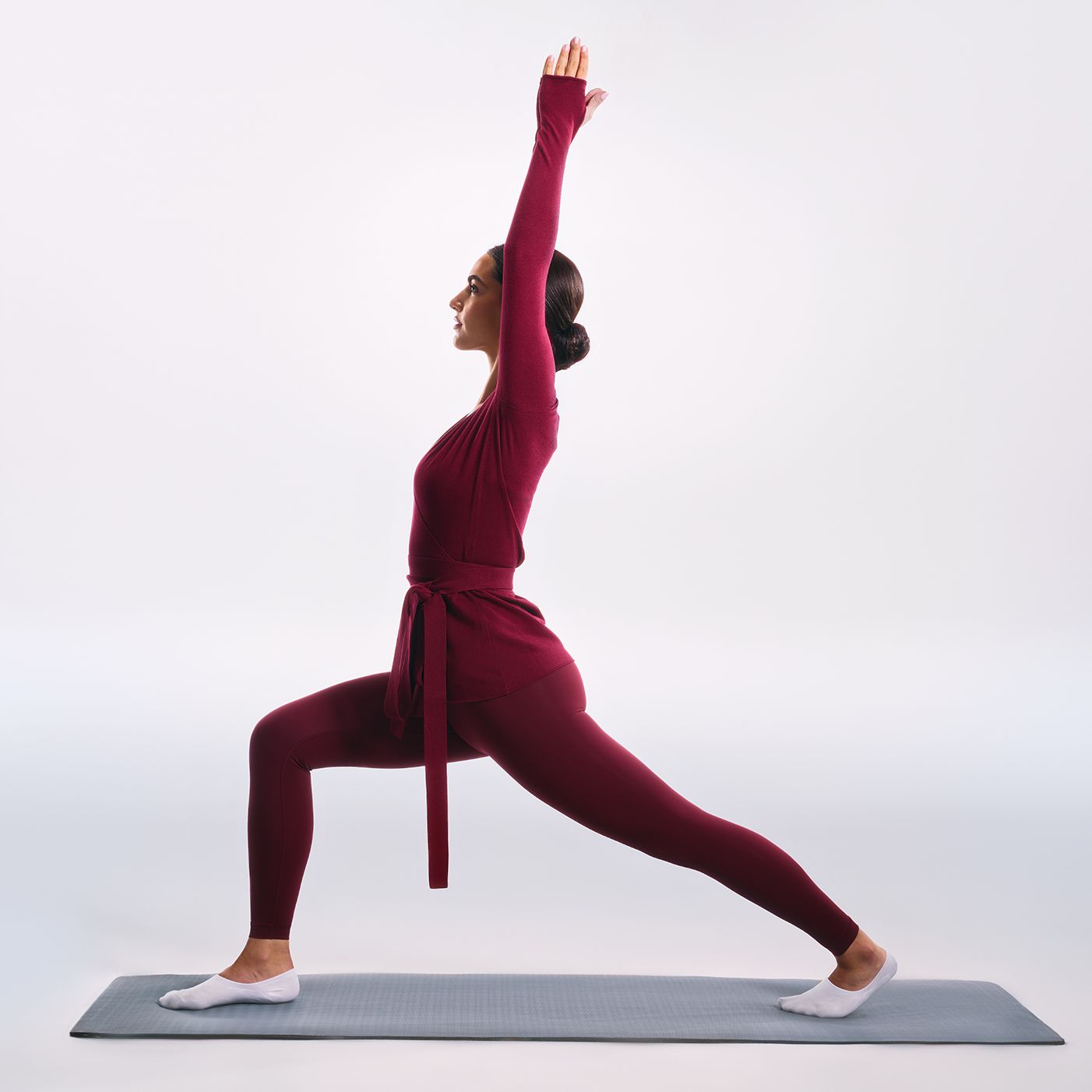 Woman wearing Kayanee, doing yoga